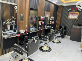 Established barber shop seeking investment with 30–35 daily walk-ins in Abu Dhabi.