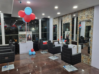 Thriving unisex salon in a prominent road of prime residential area receiving 400 monthly clients.