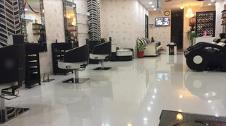 Unisex salon in Mohali offering hair, beauty, and skincare services with steady monthly sales performance.