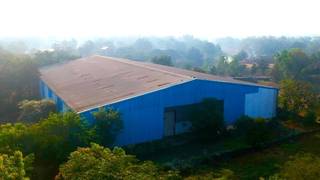 17.65-acre land with a 1-acre steel fabricated shed, ideal for commercial and industrial warehousing.
