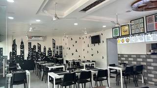 Vibrant restaurant in Hyderabad, with diverse cuisine offerings and 50-patron capacity.