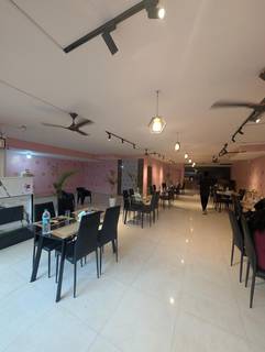 Established Bengaluru North Indian pure-vegetarian restaurant with catering services, 40-seat capacity, and a party hall.