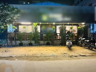 Vibrant cafe with indoor and outdoor seating, perfect for coffee lovers for sale in Telangana.