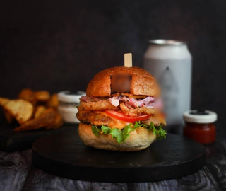 Award winning burger joint in Delhi with seating for 24 and 400+ monthly orders.