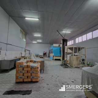 Industrial bakery with 120+ clients, 15+ bread varieties, and hourly production capacity of 1,300 units.