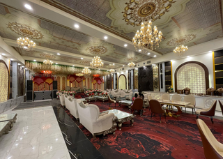 Partial stake sale in successful banquet business with strong cash flow and future growth potential.