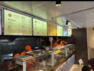 Vegetarian self-serve restaurant closed after a short operational period, targeting a diverse customer base.