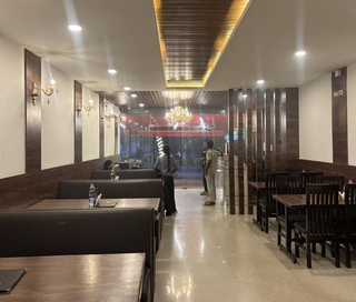 For sale: Fully equipped multi-cuisine restaurant in a prime high-visibility location, ready for immediate operations.