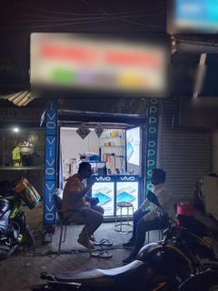 Mobile retail shop in Allahabad with a national distributorship of an entry-level smartphone brand.