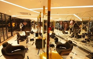 Premium unisex salon in Kochi with spacious setup and large loyal client base for sale.