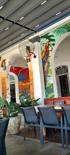Restaurant for sale in Havana featuring vibrant dining, lounge, dessert options, and high footfall.
