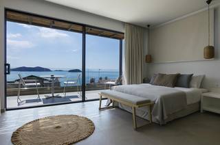 Greece-based luxury seaside suites business offered for full sale due to owner’s retirement.