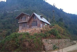 Guest house offering food experiences and bird watching in Kolakham with 7 rooms.
