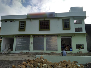 For sale: Commercial property of 8,400 sq ft, built on 14,000 sq ft land.