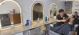 Premium men’s grooming salon in prime location with steady walk-ins, trained staff seeking strategic investment.