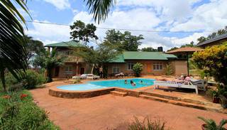 For Sale: Guest house with 20 bedrooms and 4 independent houses in Jinja, Uganda.