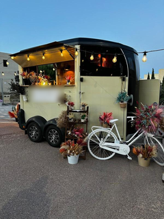 Custom mobile dried-flower cart business in Mosta seeking full sale with brand and inventory.