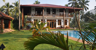 2 boutique hotels with 50 acre organic spice farm primarily acting as international Yoga Retreat.