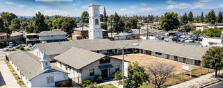 Rental income-generating commercial church property in Ontario, California, leased to pastors with redevelopment potential.
