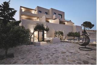 For sale: Boutique hotel with private property in Milos, achieving full high-season occupancy every year.