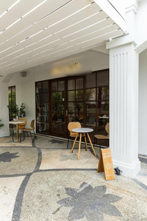 Dual-income model: Fourishing cafe and lucrative office rentals are up for sale.