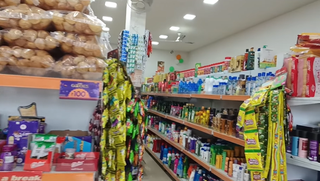 Local grocery and cosmetics retail store in India seeking full sale of the business.
