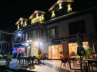 Partnership operating a hotel and resort on owned land seeks business loan to expand facilities.