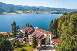 Scenic hotel in Bulgaria with 60 rooms and 60% occupancy rate, seeking investment for expansion.