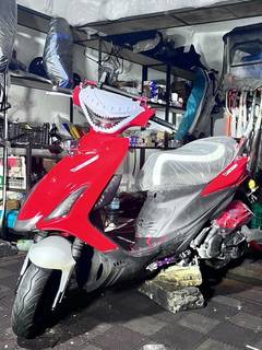 Partial stake sale in a stable motorcycle shop with diverse products and experienced leadership.