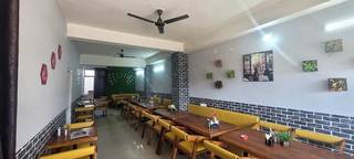Multicuisine restaurant with a cafe set-up in Ahmedabad with a seating capacity of 37.