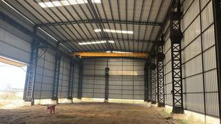 Spacious 80,000 sq. ft. Andal Airport warehouse with EOT crane/worker accommodation for rent.