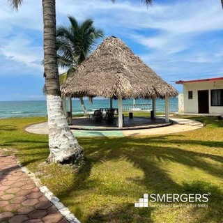 Resort on the beach in Tecolutla with 22 rooms, restaurant, bar, hosting 200-300 guests monthly.