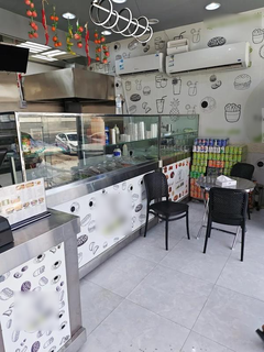 Invest in a local fast-food restaurant with loyal customers and strong falafel sales.