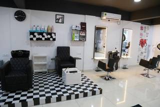 Premium unisex salon for sale in Arekere, Bangalore offering hairstyling, manicures, and pedicures.