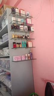 Pune-based beauty salon and cosmetics retail business with steady income, offered for full sale.