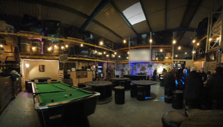 Seeking funding for a sports-themed bar with signed contracts and an identified location.