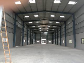 Owned industrial land of 80,000 Sq Ft with a 30,000 Sq Ft built up area.