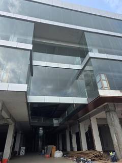 Fully-leased commercial building in Anand, Gujarat, generating rental income, available for outright sale.