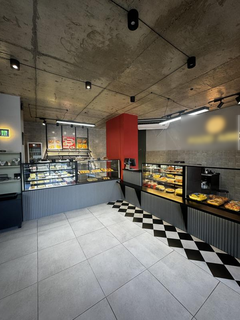 Batumi café serving Georgian–European cuisine, with high foot traffic and delivery partnerships, offered for sale.