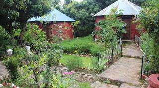 17-year-old resort with 14 rooms, garden setting, and on-site restaurant, seeks investment for expansion.