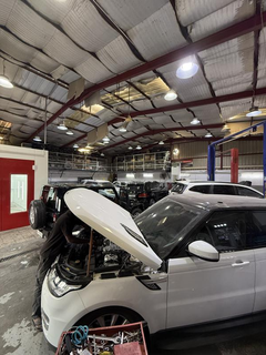Established auto repair workshop offering mechanical repairs, painting, and denting with strong reputation for expertise.