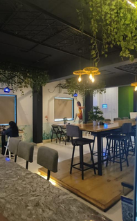 Cozy café for full sale, known for diverse cuisine and a strong customer base.