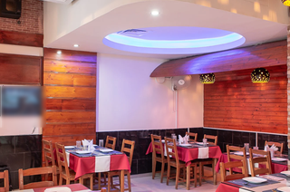 49% equity for sale in a North Indian pure veg restaurant in International City, Dubai.