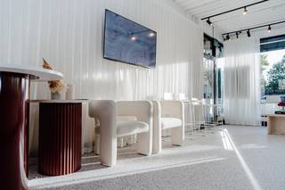 Partial stake sale in a successful brow and cosmetic tattoo studio to scale client acquisition.