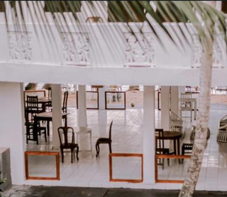 Beachfront luxury hotel business with serene dining experience in Sri Lanka, and plans for expansion.