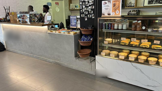 Fully equipped specialty coffee shop in prime startup hub available for acquisition or investment opportunity.