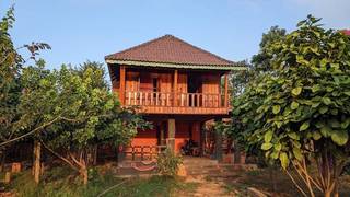 Eco-tourism resort in Cambodia offering homestays, trekking, and community development programs for 300-500 international travelers/year.