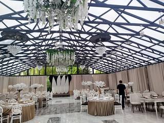 Zaqatala-based banquet hall and restaurant complex offering event hosting, accommodation, with consistent rental income model.