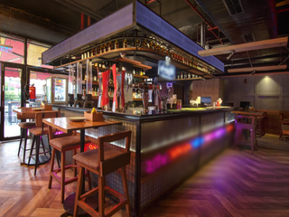 Restaurant and bar for sale in Noida with a strong financial performance and corporate partnerships.