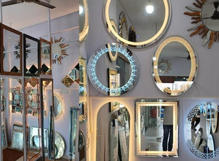 Business loan required to expand inventory for popular LED mirrors and home furnishing business.